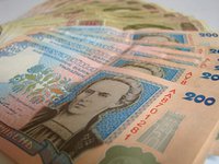 Курс гривни на межбанке в четверг укрепился до 27,77 грн/$1