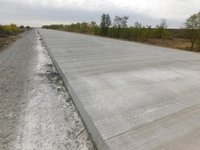 На трассе Н-14 в Николаевской области начали укладку финишного слоя цементобетона